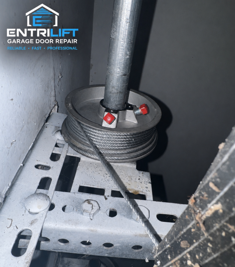 Garage door cable wrapped on cable drum during professional repair in Bloomfield CT