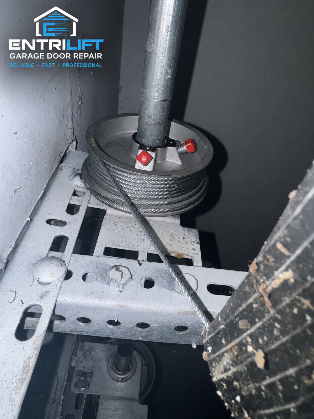 Garage door cable wrapped on cable drum during professional repair in Bloomfield CT