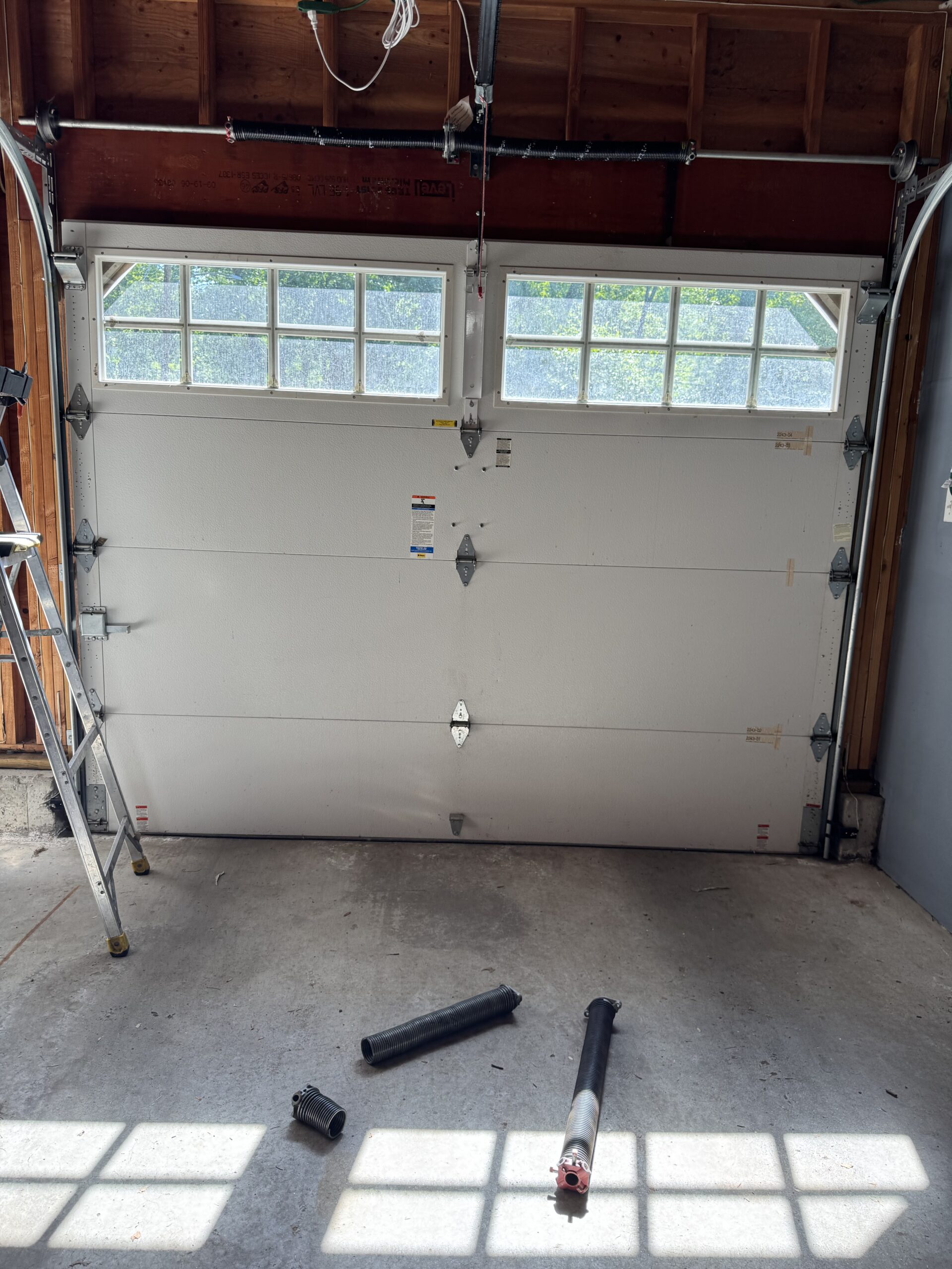 Garage door torsion spring replacement in Newington CT