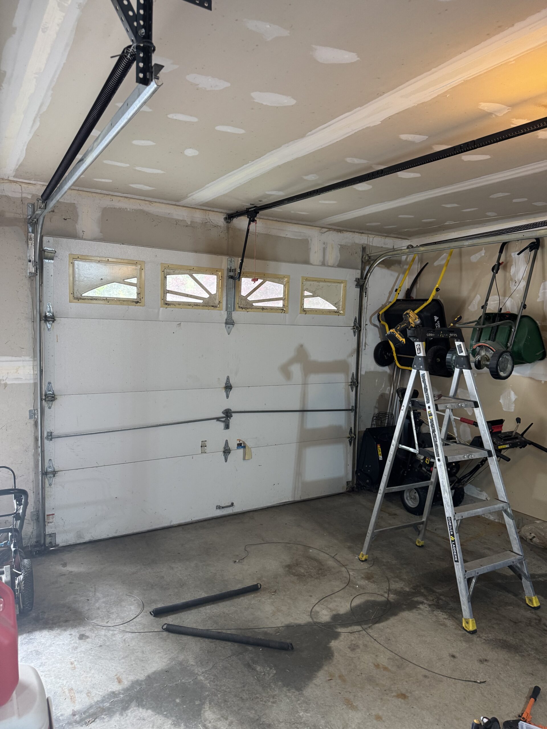 Garage door extension spring replacement in South Windsor CT